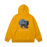 Back view of a bright mustard-yellow hoodie featuring a futuristic robot graphic and the text “All of us are on a mission,” with a bold, upbeat feel.
